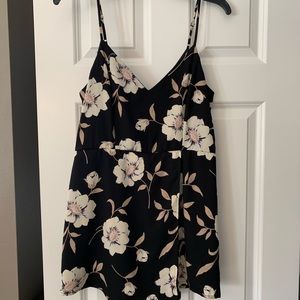 Lulu’s romper size Medium but fits like small.